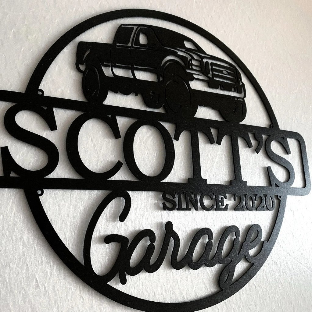 Metal car garage sign with custom name and year